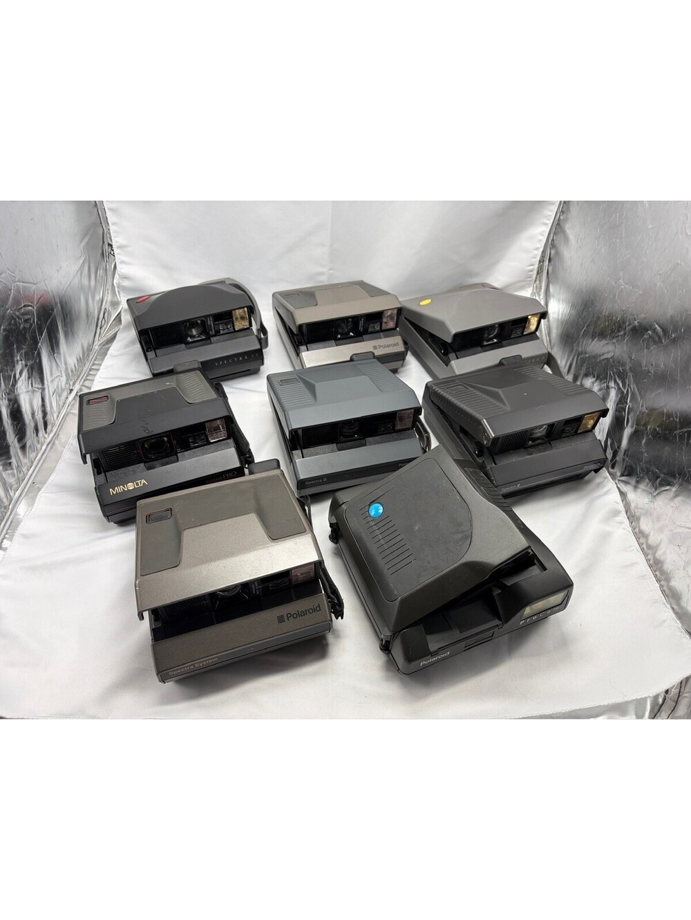 Lot of 8 1200 Vintage Polaroid Instant Film Cameras Spectra System 2 SE Untested